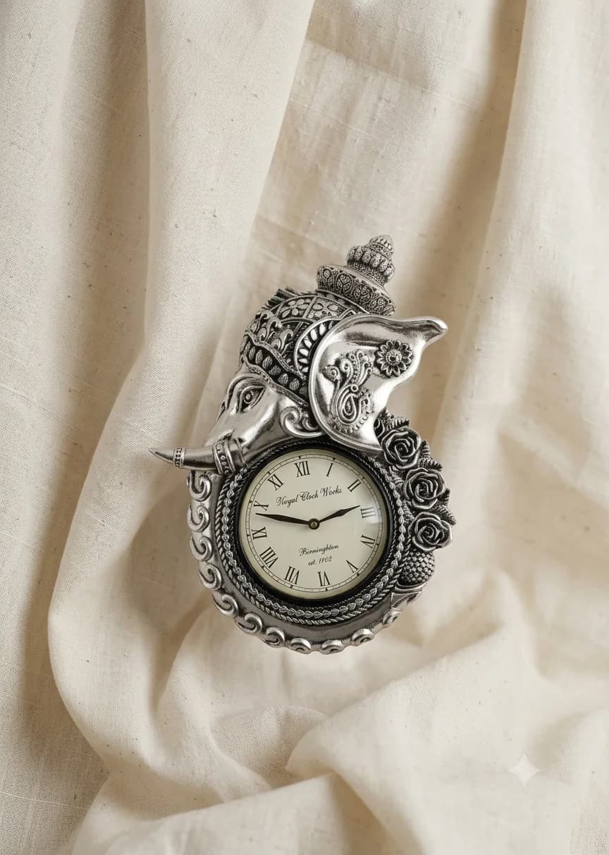 Repoussé — elephant mantel clock